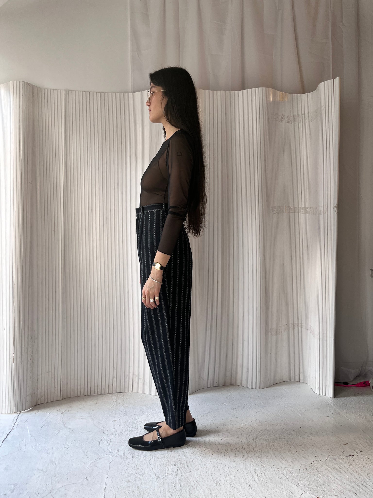 Black, grey, and pink striped wool pants