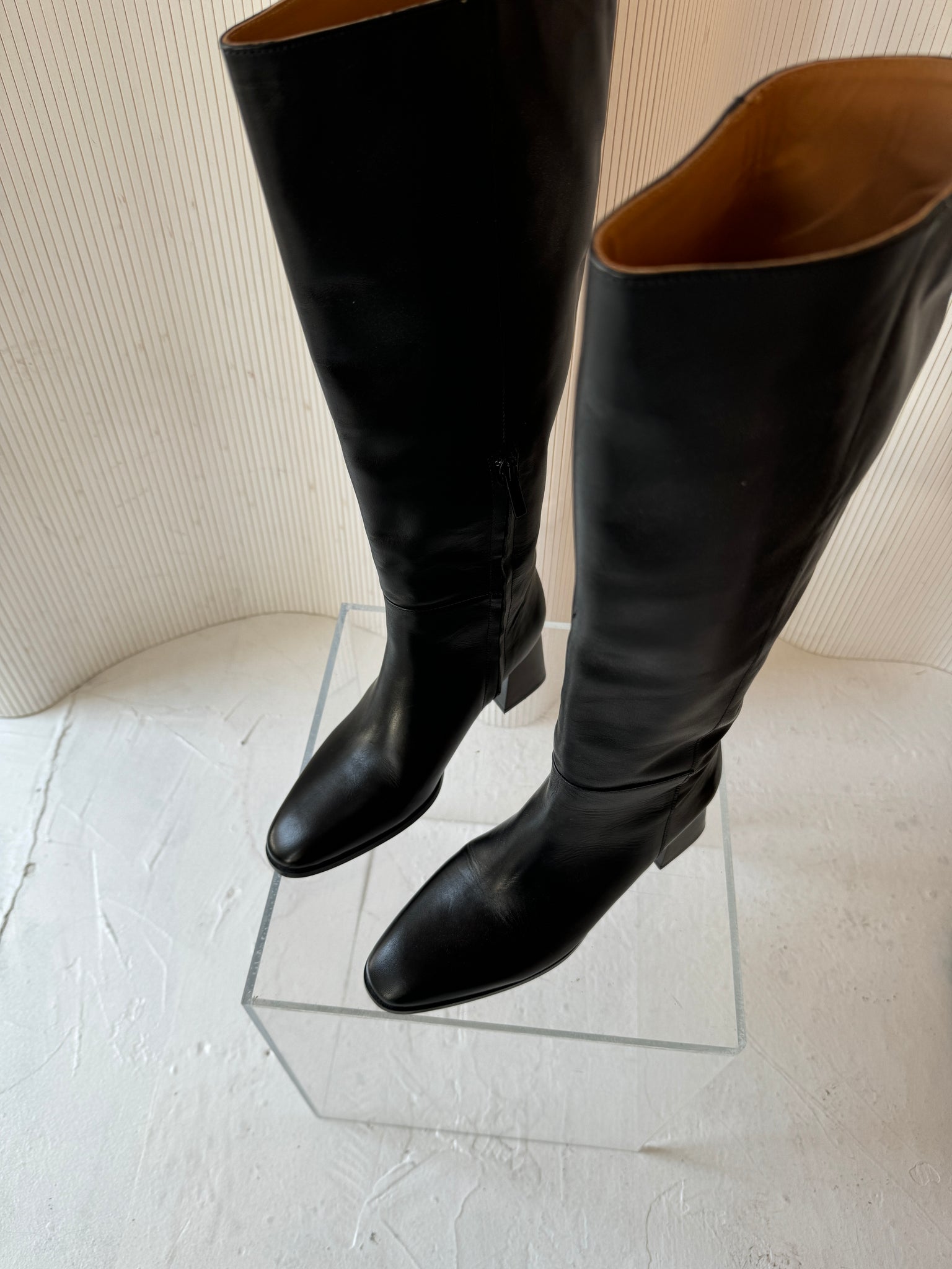 Flattered leather knee high boot