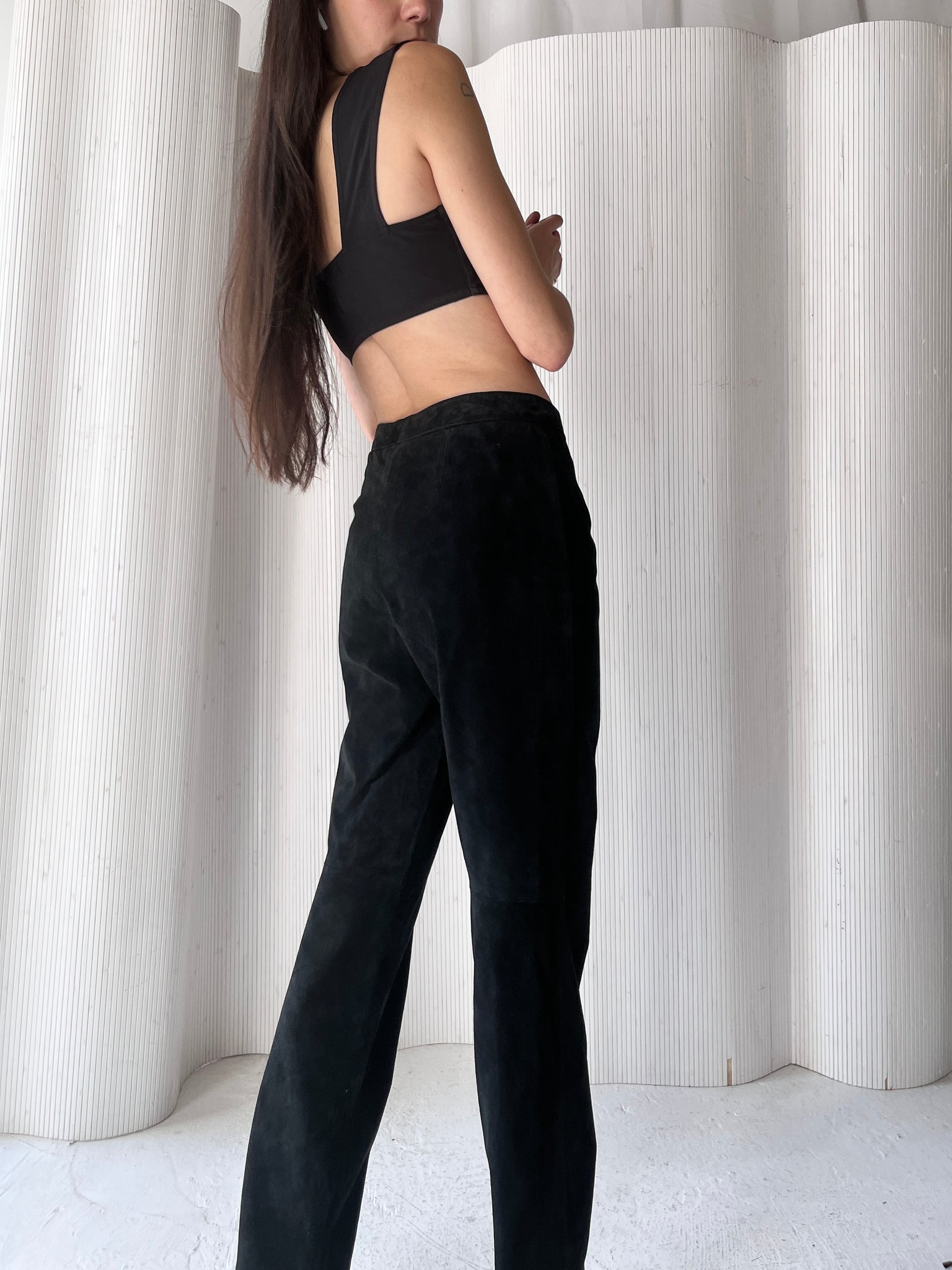 Black suede low rise pants