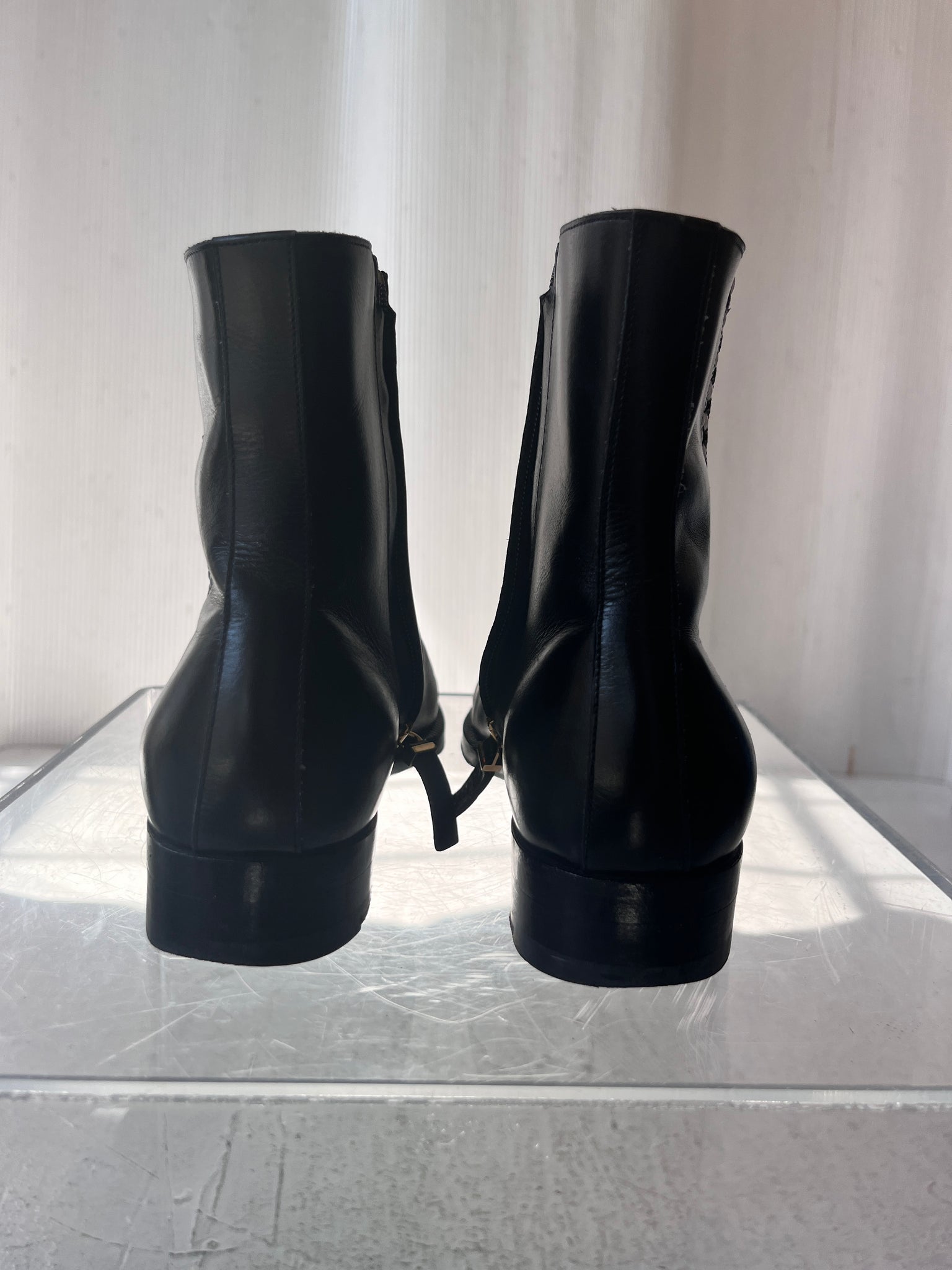 The Row black leather boot